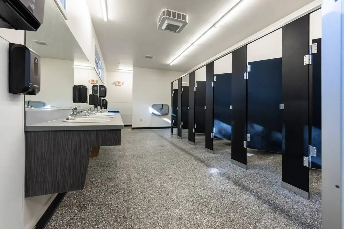 Commercial restroom floor with professional concrete coating